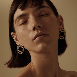 GHO Plane Misalignment Spiral Earrings