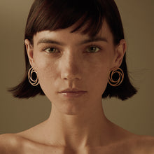 Load image into Gallery viewer, GHO Plane Misalignment Spiral Earrings
